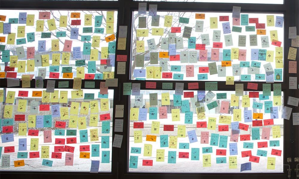 post-it messages of inclusion and openness in support of Michigan Engineering international students