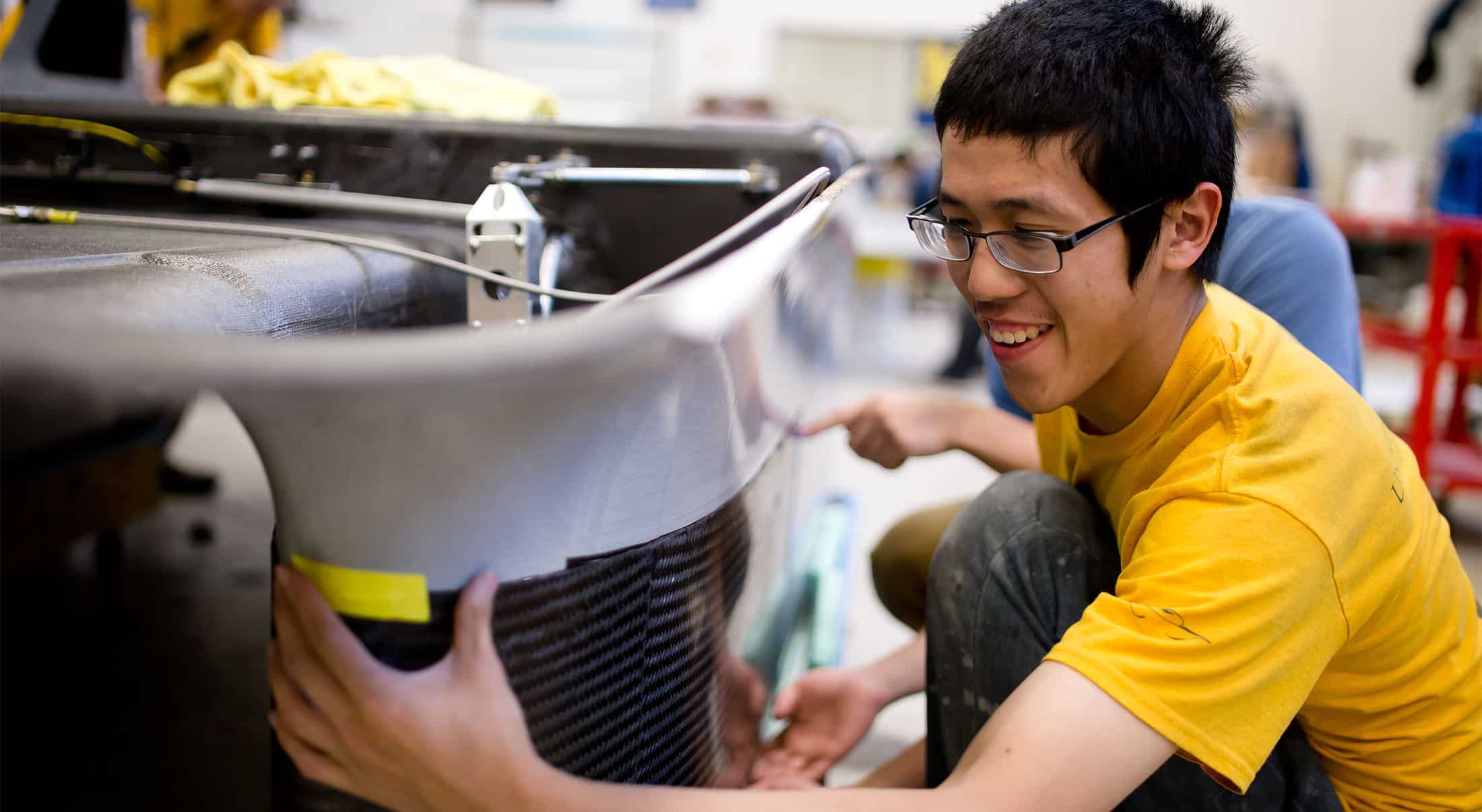 diverse student working on generation solar car