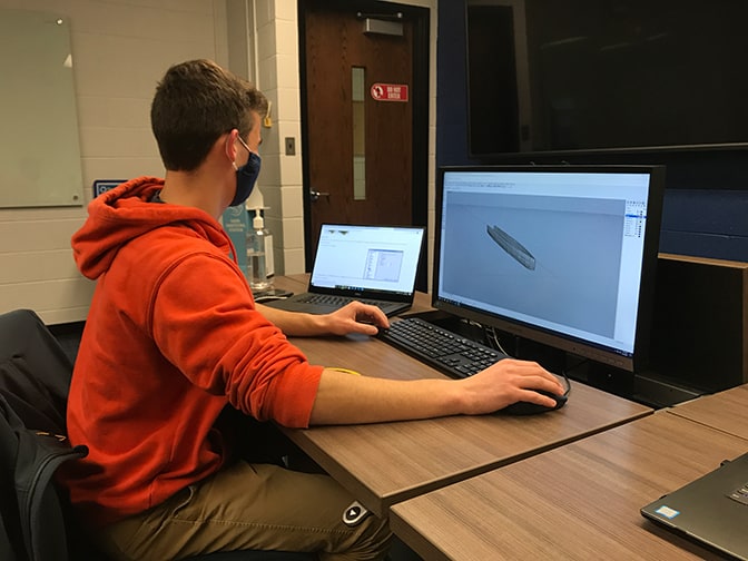 student working on the computer